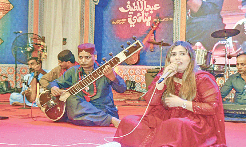 A SINGER presents Shah Latif Bhitai’s kalam on the concluding day of the urs.—Dawn A SINGER presents Shah Latif Bhitai’s kalam on the concluding day of the urs.—Dawn