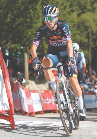 PRIMOZ Roglic crosses the finish line to win the eighth stage of La Vuelta a Espana on Saturday.&mdash;AFP