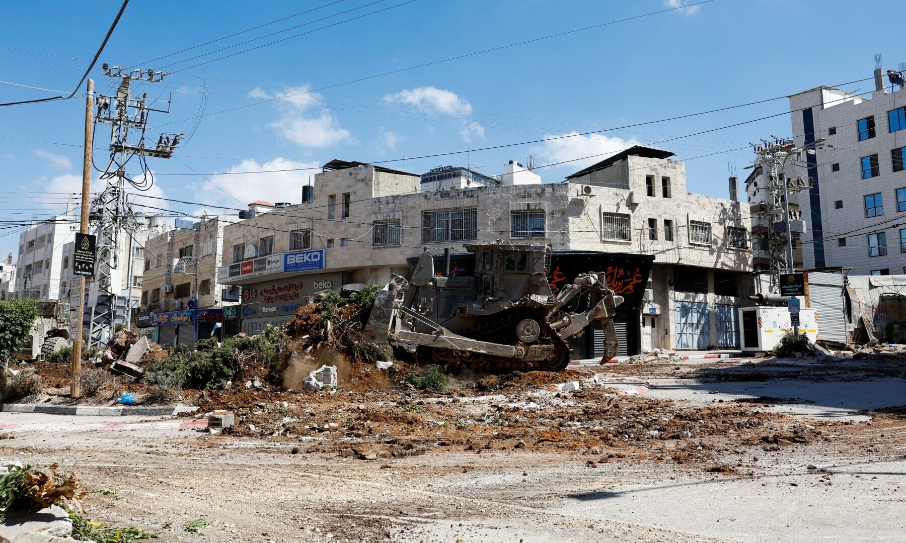  An Israeli bulldozer operates during an Israeli raid in Tulkarm, Israel-occupied West Bank on Sept 4, 2024. &mdash; Reuters/Mohammed Torokman 