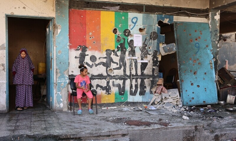 Displaced Palestinians inspect the damage at the site of an Israeli strike on a school housing displaced Palestinians in Gaza City&rsquo;s Zaytoun neighbourhood on September 21. &mdash; AFP
