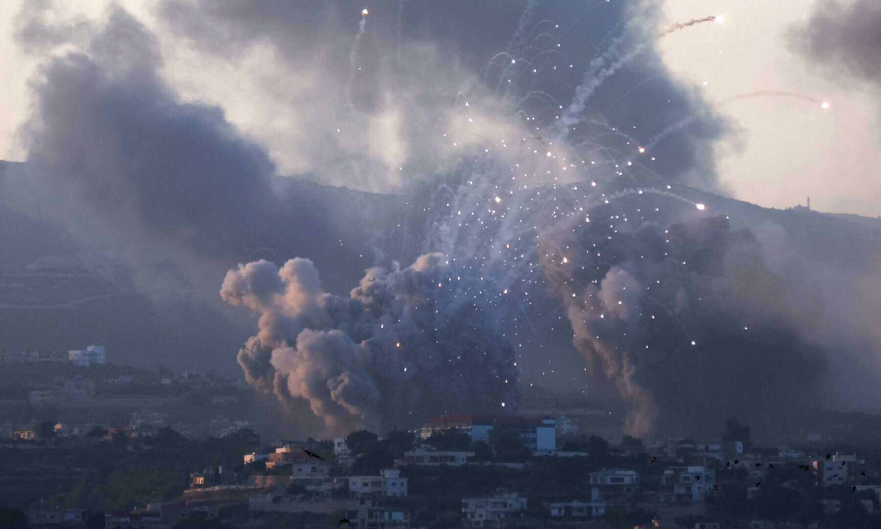 Smoke billows over southern Lebanon following Israeli strikes, as seen from Tyre, southern Lebanon on Sept 23, 2024. — Reuters/Aziz Taher