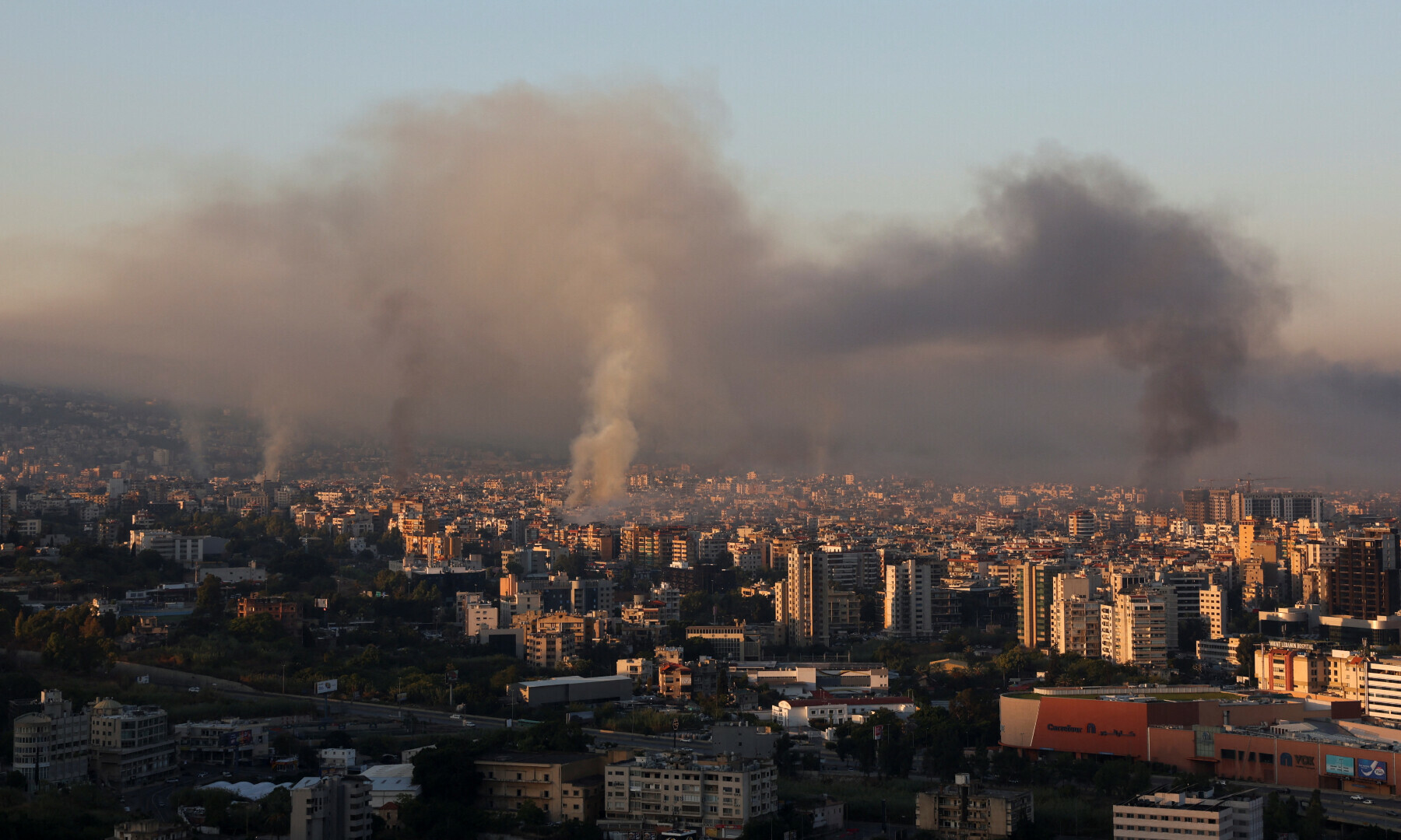  Smoke billows over Beirut&rsquo;s southern suburbs, amid ongoing hostilities between Hezbollah and Israeli forces, as seen from Sin El Fil, Lebanon on Sept 28, 2024. &mdash; Reuters 