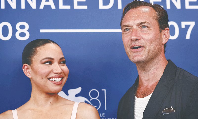 Cast members Jude Law (right) and Jurnee Smollett pose during a preview  for The Order at the Venice Film Festival, on Saturday.&mdash;Reuters