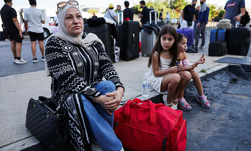 Mariam Darwish, a Lebanese Turkish citizen, looks on after an Interview with Reuters TV as she waits to register for boarding the Turkish navy ships to leave Lebanon, amid the ongoing hostilities between Hezbollah and Israeli forces, in Beirut, Lebanon on October 9. &mdash; Reuters