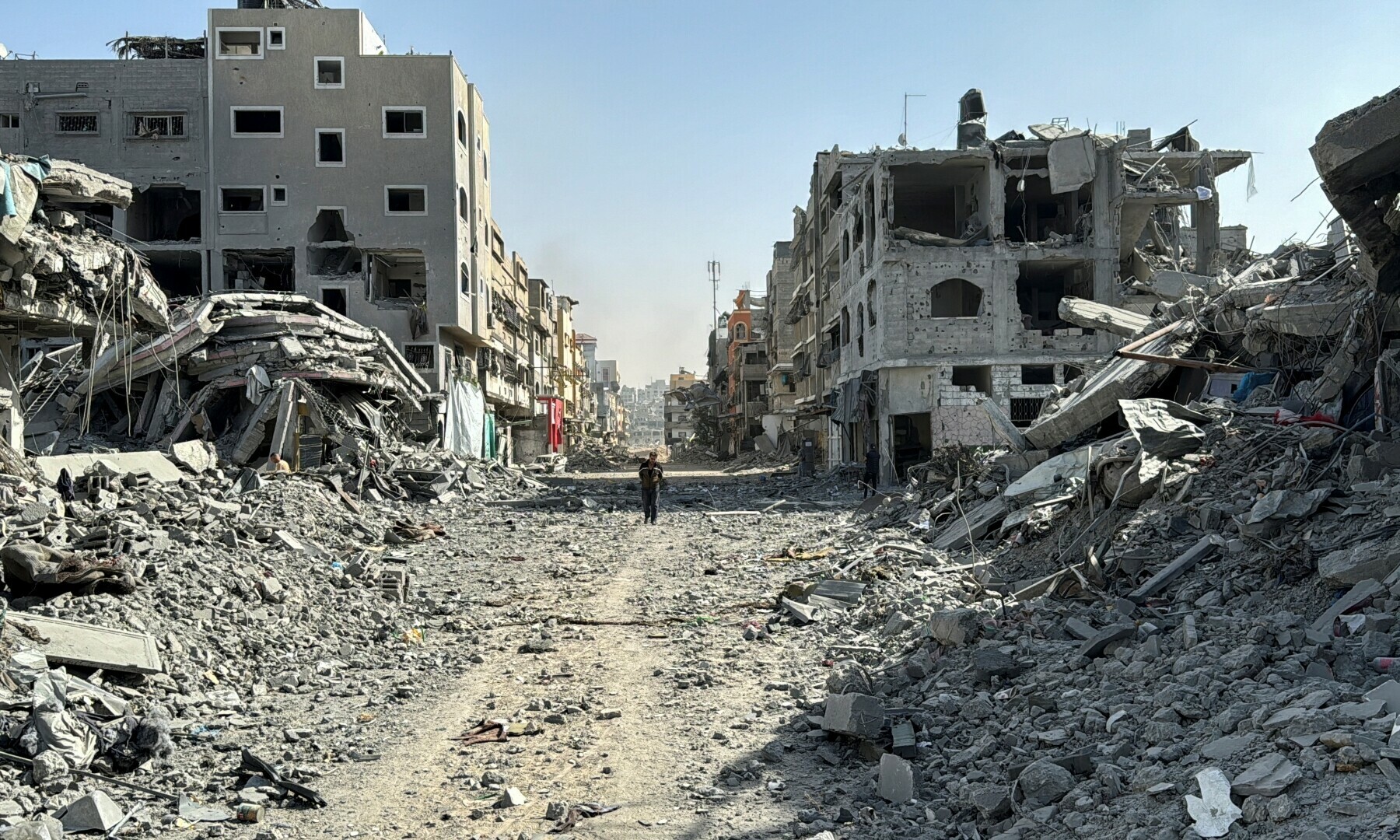  A Palestinian man walks past the rubble after Israeli forces withdrew from the area around Kamal Adwan hospital, in Jabalia in the northern Gaza Strip on Oct 26, 2024. — Reuters 