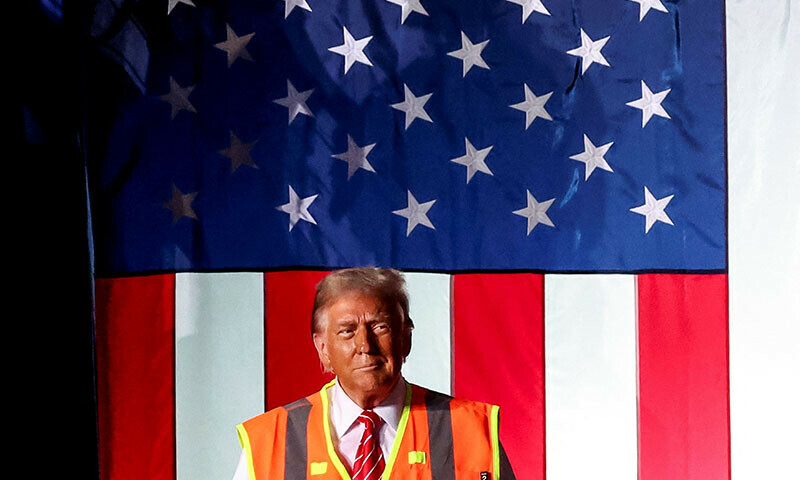 Republican presidential nominee and former U.S. President Donald Trump attends a campaign rally, in Green Bay, Wisconsin, U.S., October 30, 2024. REUTERS/Brendan McDermid