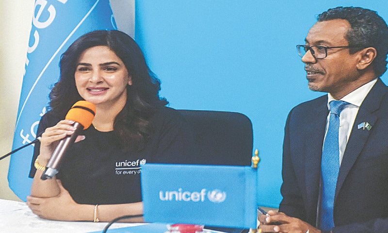 Actor Saba Qamar, along with Unicef representative in Pakistan Abdullah Fadil, speaks at the event, on Friday.&mdash;Fahim Siddiqi / White Star