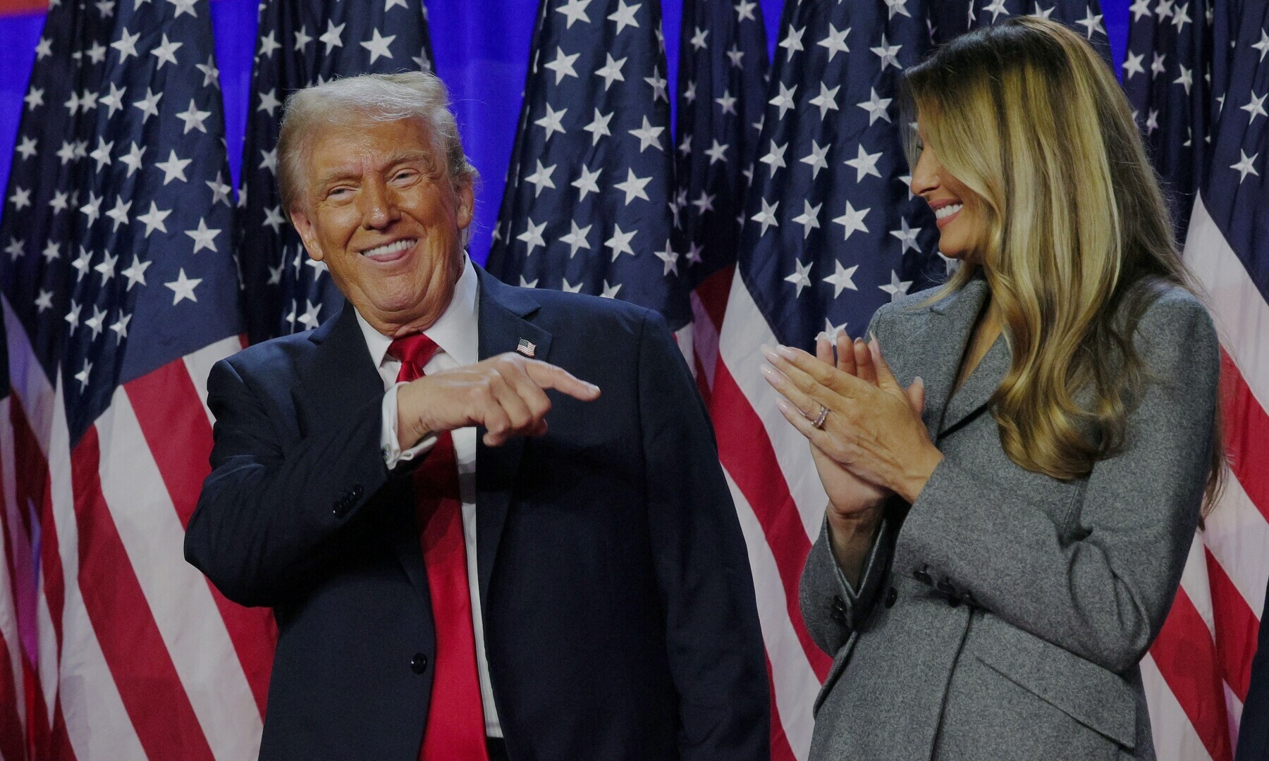  Donald Trump points to his wife Melania at Trump&rsquo;s Election rally, at the Palm Beach County Convention Center in West Palm Beach, Florida, US on November 6. &mdash; Reuters 
