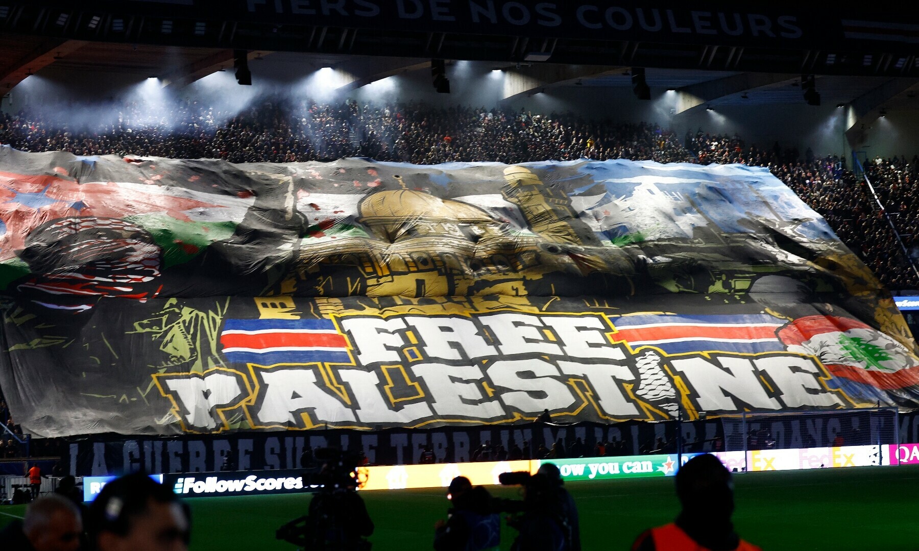  A banner in support of Palestine is displayed in the stands before a Champions League match between Paris St Germain and Atletico Madrid at Parc des Princes, Paris, France on November 6. &mdash; Reuters 