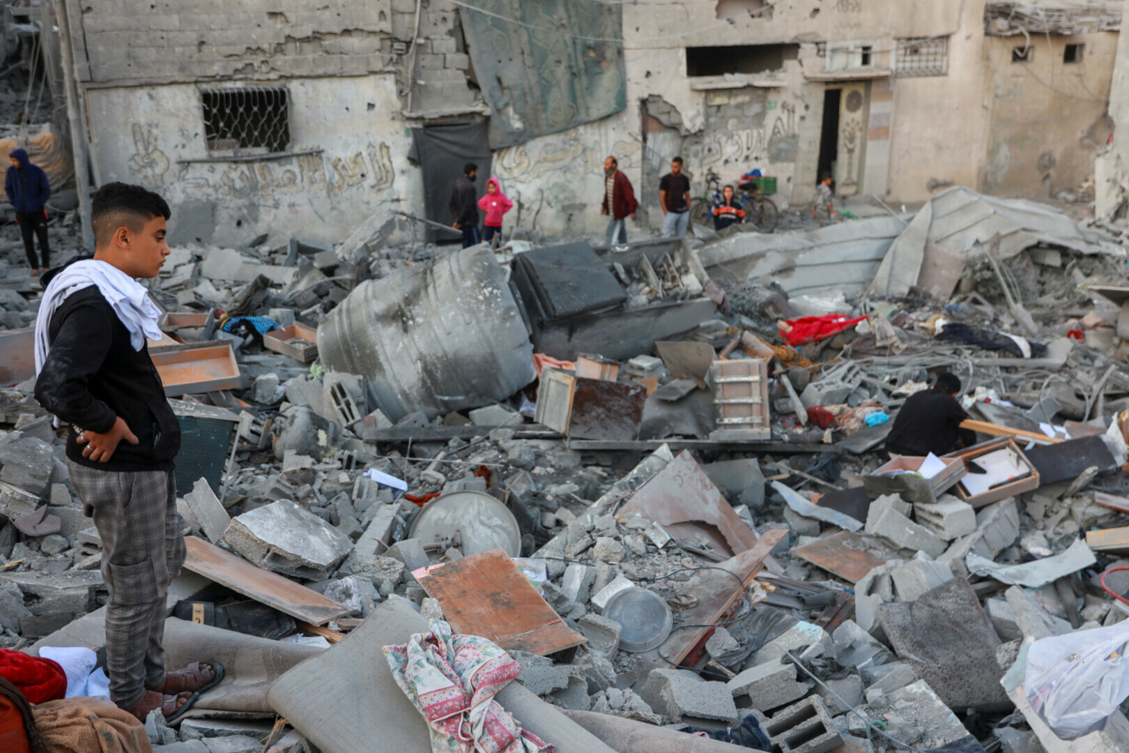 A child at the site of an Israeli strike on a house, amid the Israeli bombardment of Gaza, in Nuseirat in the central Gaza Strip on November 7. &mdash; Reuters
