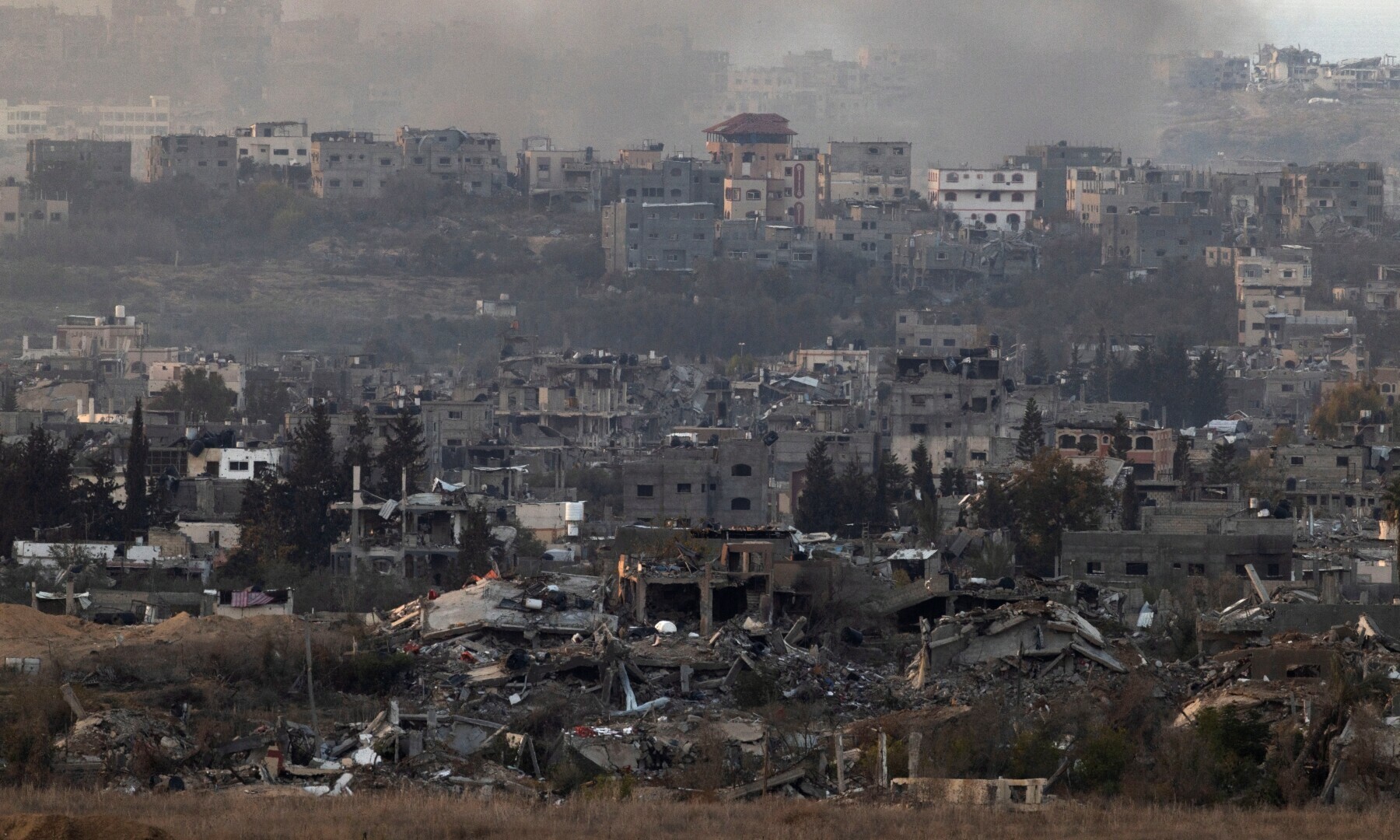 Smoke rises from Gaza, as seen from the Israeli side of the border. — Reuters