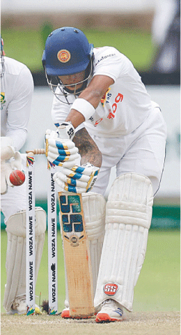 SRI LANKAN opener Pathum Nissanka plays a defensive shot during the second Test against South Africa at St Georges Park on Friday.&mdash;AFP
