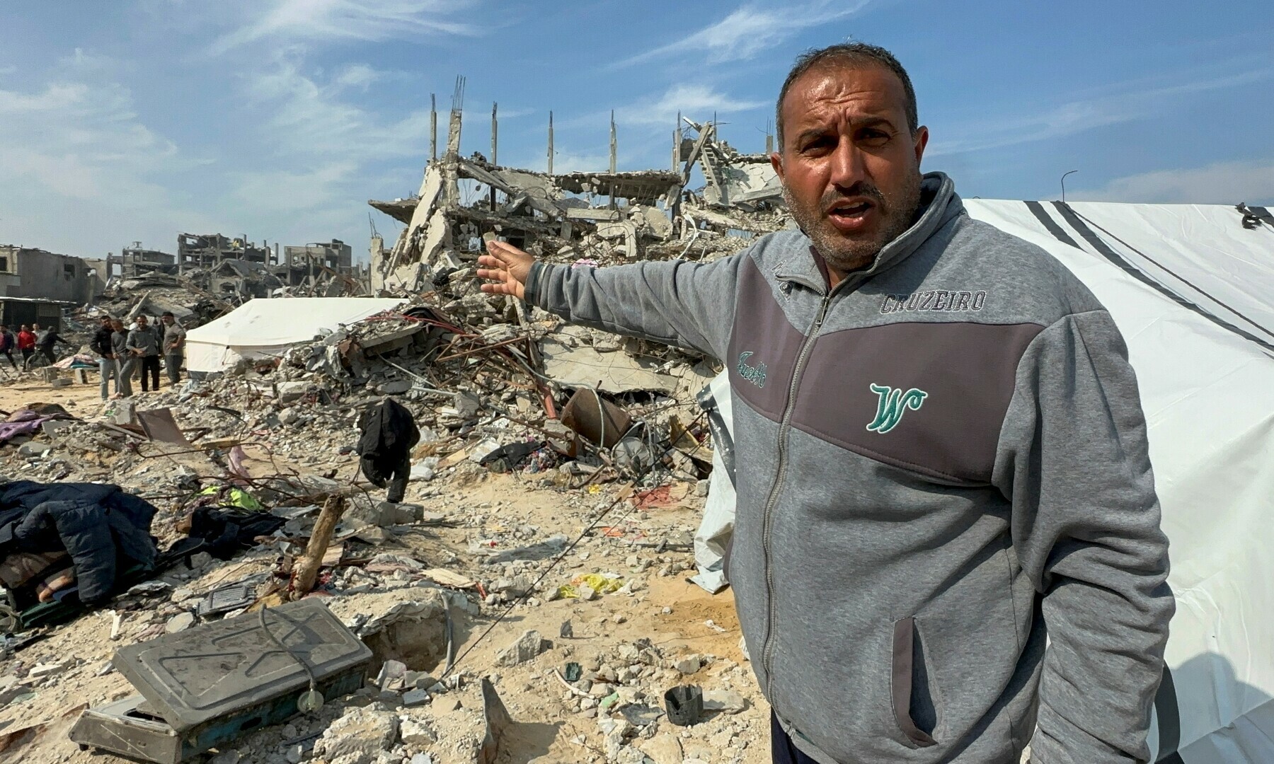 A Palestinian man, who was displaced at Israel&rsquo;s order during the war, reacts after returning to his destroyed house, in Jabalia refugee camp in the northern Gaza Strip on January 28. &mdash; Reuters/Moaz Abu Taha 