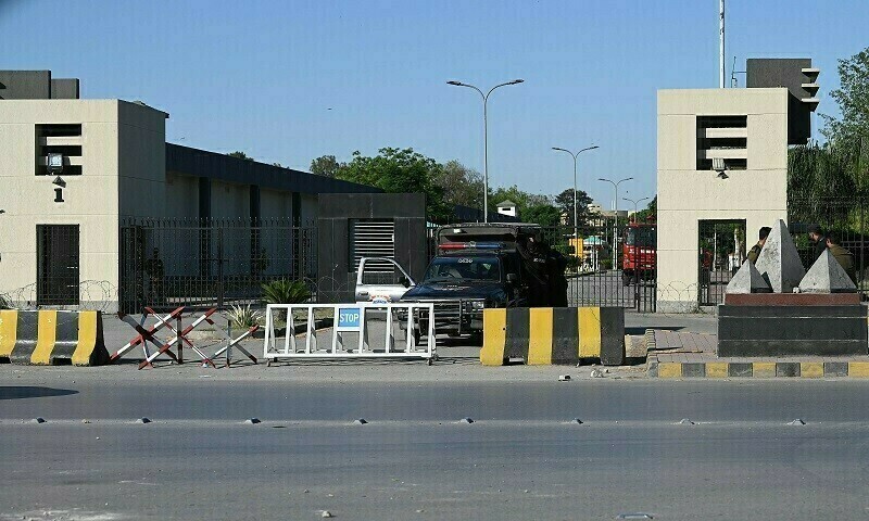 Policemen stand guard at the main entrance of the army&rsquo;s General Headquarters (GHQ) in Rawalpindi on May 10, 2023. &mdash; Reuters/File