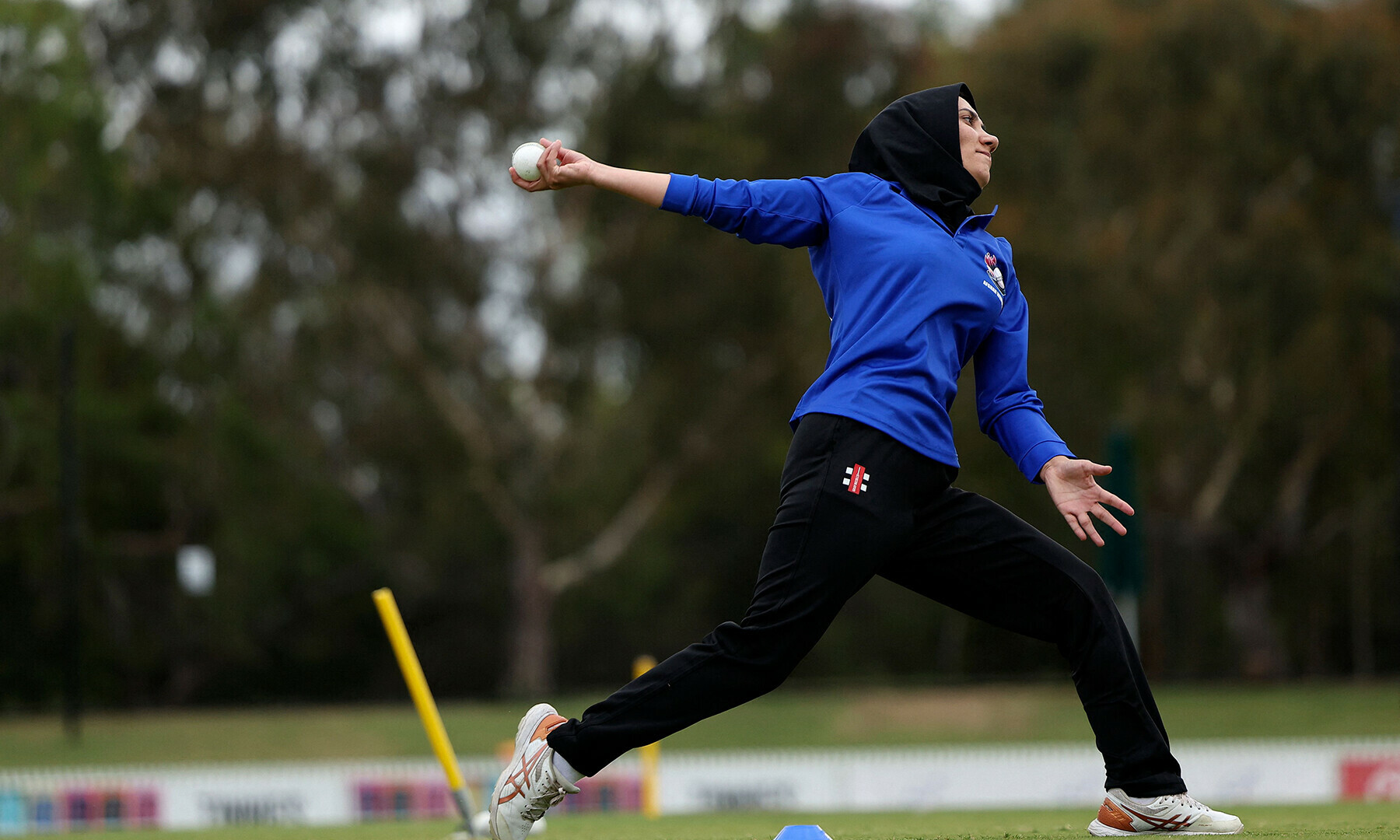 A player of Afghanistan Women’s XI warms up before the cricket match between Afghanistan Women’s XI and Cricket Without Borders XI at Junction Oval in Melbourne, Australia on January 30. — AFP