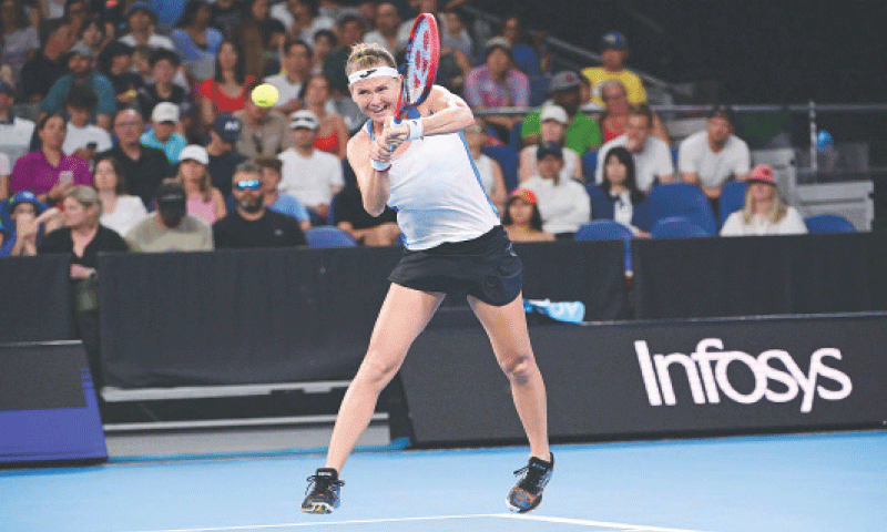 MARIE Bouzkova of the Czech Republic hits a return against Russia’s Mirra Andreeva during their Australian Open first-round match at Melbourne Park on Sunday.—AFP