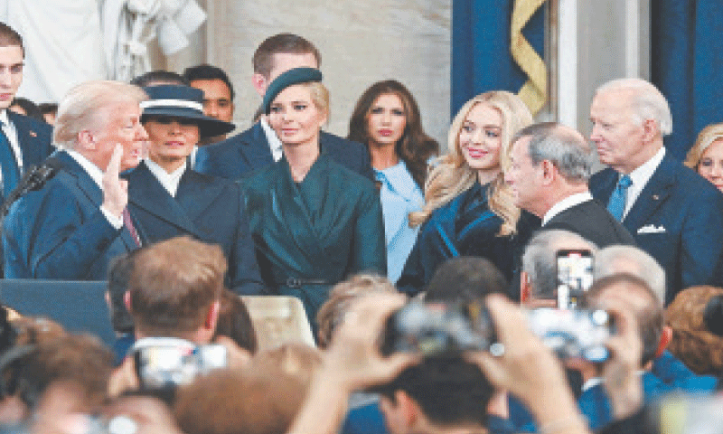 Donald Trump is sworn in as the 47th US president by Supreme Court Chief Justice John Roberts, as his wife Melania, daughters Ivanka and Tiffany, and outgoing president Joe Biden look on.&mdash;AFP