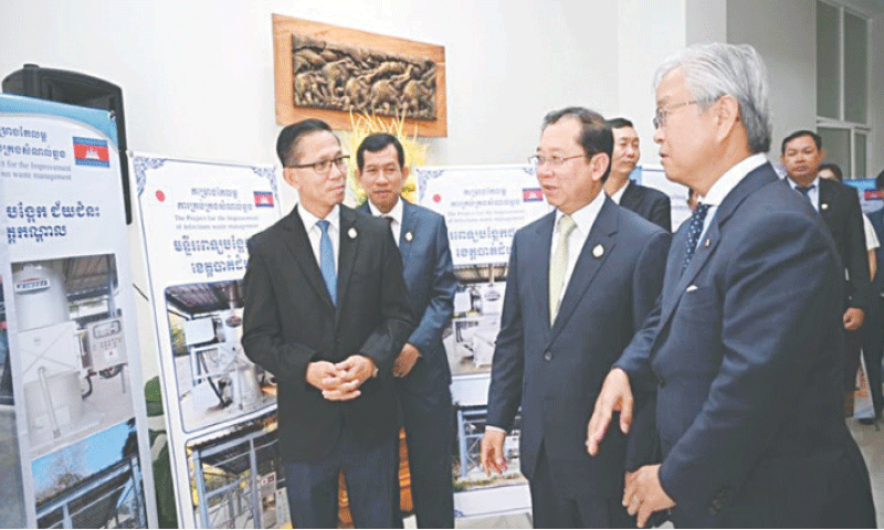 Japanese ambassador Ueno Atsushi (right) and health minister Chheang 
Ra (second from right) attend the handover ceremony of 29 medical 
incinerators.&mdash;Courtesy The Phnom Penh Post
