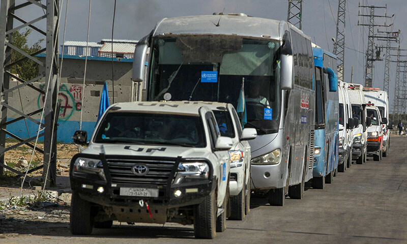  A convoy of vehicles carrying Palestinian patients and wounded from Gaza heads towards the Rafah border crossing with Egypt on February 1. &mdash; Reuters 