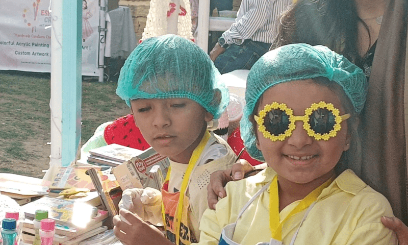 Zara Waqas (R) at the Children’s Market, organised by TDF MagnifiScience Centre, in Karachi on Saturday. — Photo by author