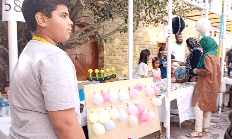 Balloons tied to a board at another stall at the Children’s Market, organised by TDF MagnifiScience Centre, in Karachi on Saturday. — Photo by author