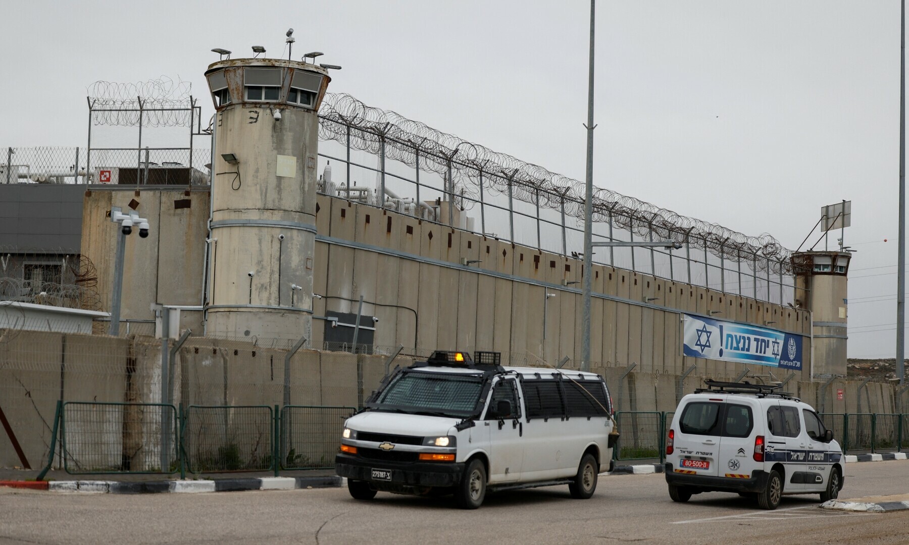 Vehicles move outside the Israeli military prison, Ofer, on the day Israel is expected to release Palestinian prisoners as part of the Gaza ceasefire deal, near Ramallah, in the Israeli-occupied West Bank on Feb 22, 2025. — Reuters/Ammar Awad