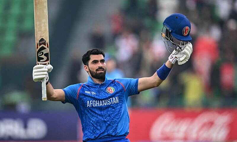 Afghanistan&rsquo;s Ibrahim Zadran celebrates after scoring a century during the ICC Champions Trophy ODI cricket match against England at the Gaddafi Stadium in Lahore on February 26. &mdash; AFP