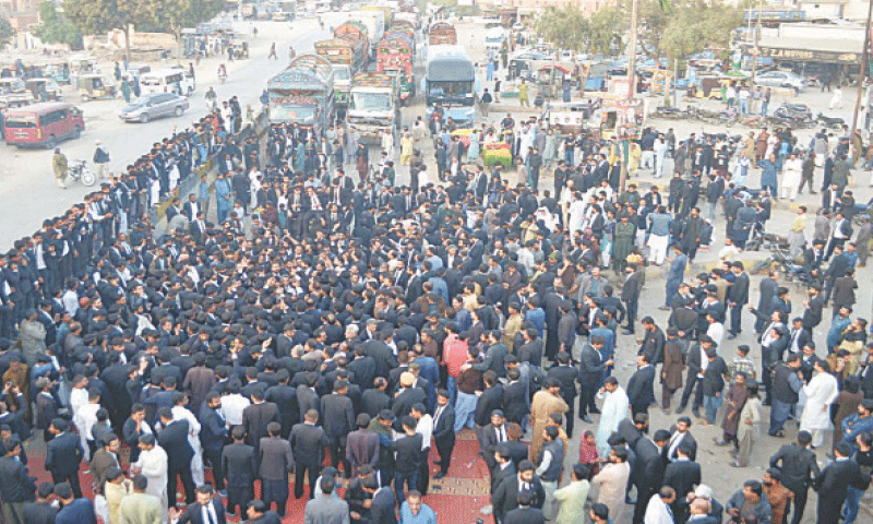 LAWYERS gather at Hyderabad bypass to resume their sit-in on Thursday after an overnight break.&mdash;Photo by Umair Ali