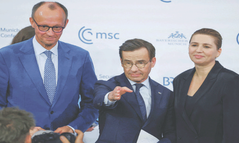 Christian Democratic Union leader Friedrich Merz (left), Danish Prime Minister Mette Frederiksen (right) and Swedish Prime Minister Ulf Kristersson pose for pictures at the Munich Security Conference, on Saturday.—Reuters Christian Democratic Union leader Friedrich Merz (left), Danish Prime Minister Mette Frederiksen (right) and Swedish Prime Minister Ulf Kristersson pose for pictures at the Munich Security Conference, on Saturday.—Reuters