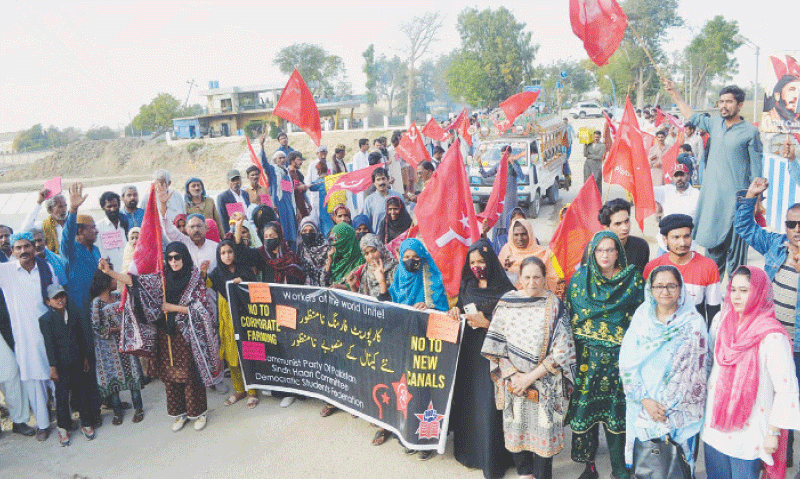 LEADERS and workers of the Communist Party of Pakistan hold a demonstration on Jamshoro Road in Hyderabad on Sunday.&mdash;Dawn