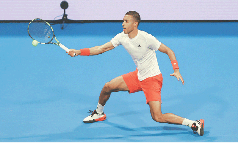 CANADA’S Felix Auger Aliassime hits a return against Andrey Rublev of Russia during the Qatar Open semi final at the Khalifa International Tennis and Squash Complex.—Reuters CANADA’S Felix Auger Aliassime hits a return against Andrey Rublev of Russia during the Qatar Open semi final at the Khalifa International Tennis and Squash Complex.—Reuters