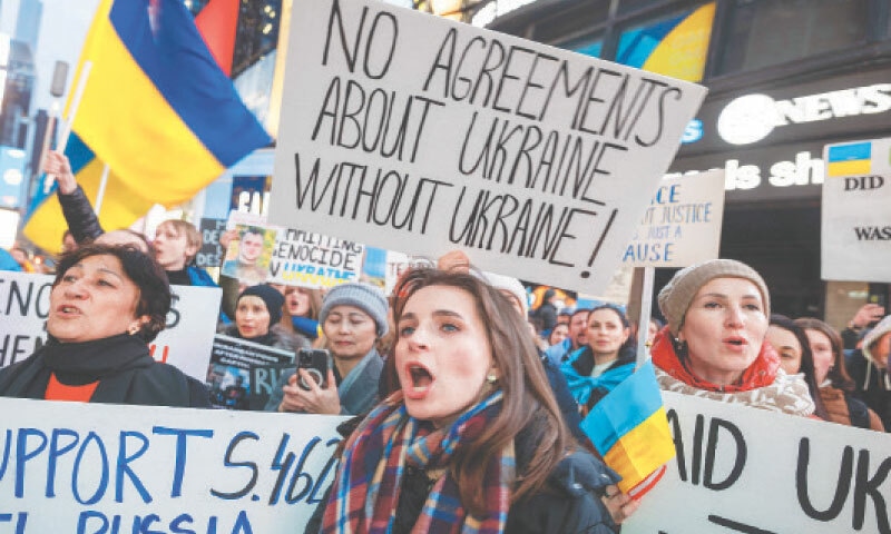 Supporters of Ukraine rally in New York&rsquo;s Times Square to mark the three-year anniversary of the invasion by Russia.&mdash;AFP