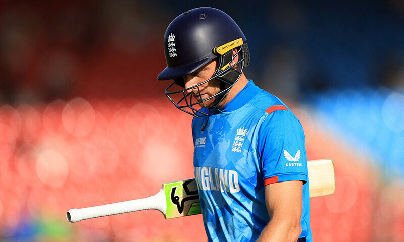 England’s Jos Buttler walks back to the pavilion after losing his wicket, caught out by South Africa’s Keshav Maharaj off the bowling of Lungi Ngidi during the ICC Men’s Champions Trophy match between England and South Africa in Karachi. — Reuters