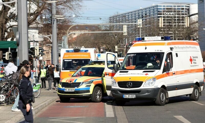 Ambulance vehicles are parked near the scene after a car drove into a crowd, in Mannheim, Germany on March 3. &mdash; Reuters