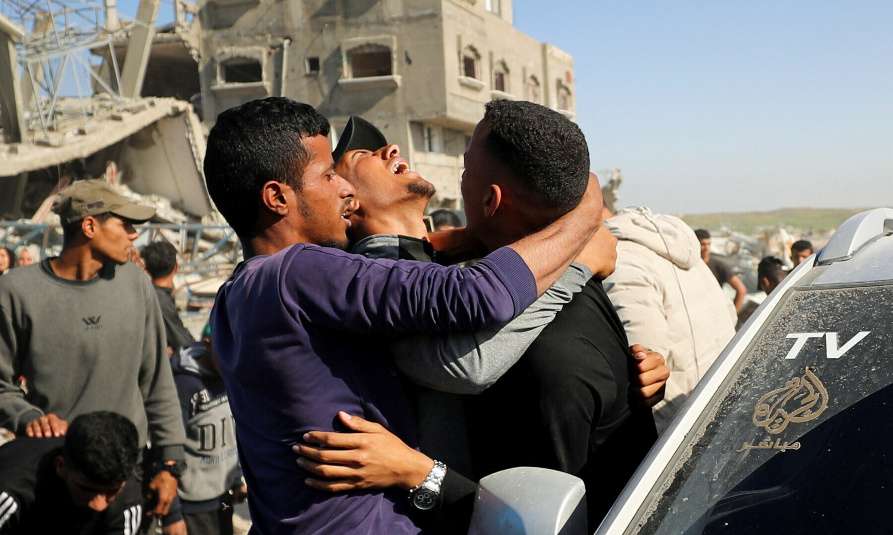 Palestinians react at the site of an Israeli strike, which according to medics, killed journalist Hossam Shabat, in the northern Gaza Strip on March 24, 2025. — Reuters/Mahmoud Issa