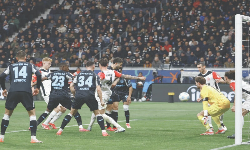 FRANKFURT: Bayer Leverkusen&rsquo;s Nordi Mukiele (third L) scores against Eintracht Frankfurt during their Bundesliga match at the Deutsche Bank Park.&mdash;Reuters