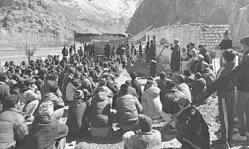 PROTESTERS hold a sit-in at the Kargil Road in Kharmang district, on Monday.&mdash;Photo by the writer