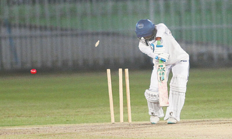 RAWALPINDI: SBP batter Mohammad Ismail is cleaned up by PTV pacer Mohammad Shahzad during the President’s Trophy Grade-I final at the Rawalpindi Cricket Stadium.—courtesy PCB