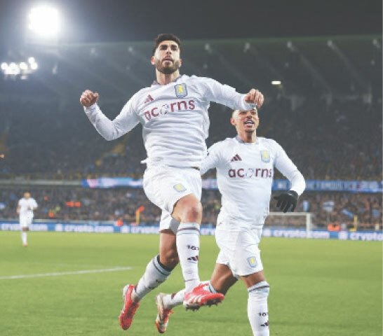 BRUGES: Aston Villa’s Marco Asensio celebrates scoring against Club Brugge during their last-16 first leg at the Jan Breydel Stadium.—Reuters