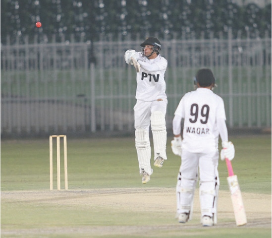 PTV batter Mohammad Shahzad plays a shot during the President’s Trophy Grade-I final against SBP at the Rawalpindi Cricket Stadium.—courtesy PCB
