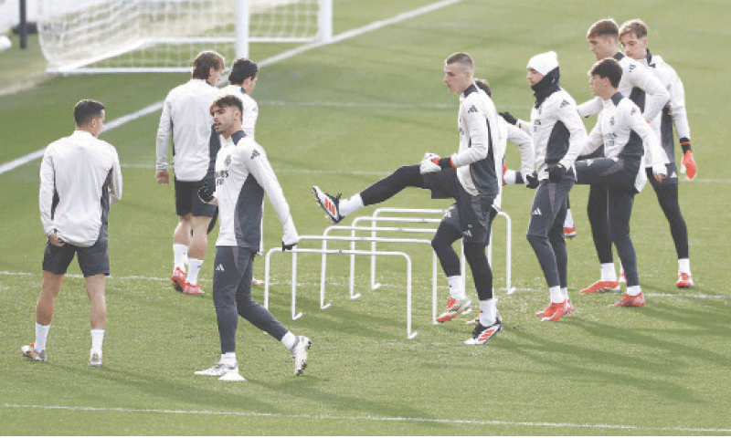 MADRID: Real Madrid players in action during a training session on Tuesday.&mdash;Reuters
