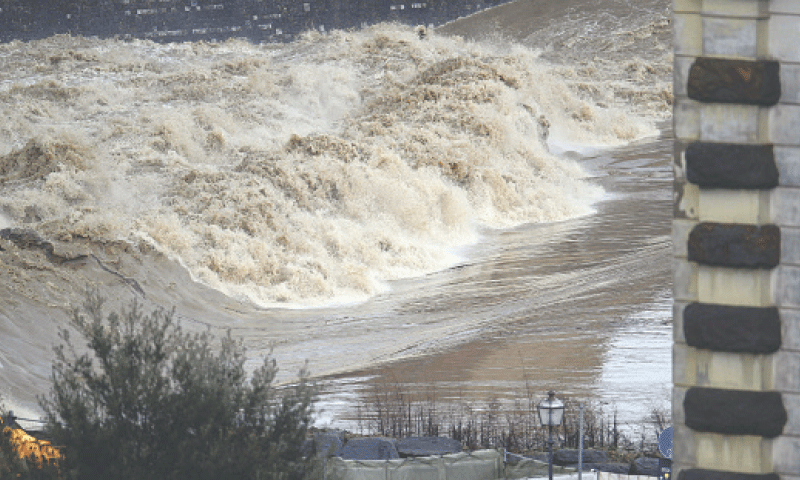 A view of a swollen river as a flood peak passes through Florence, Italy.—AFP