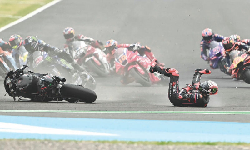 SANTIAGO DEL ESTERO: Aprilia Racing’s Marco Bezzecchi falls off his bike at the start of the Argentina MotoGP at the Termas de Rio Hondo circuit.—AFP