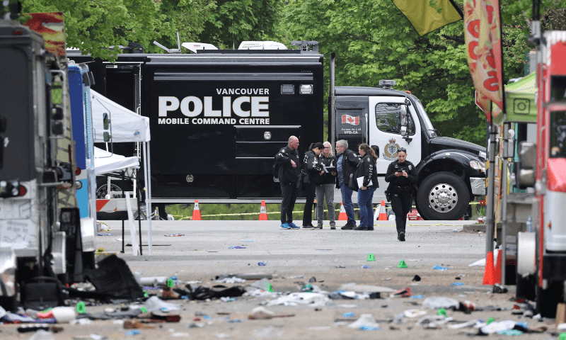 Police officers work at the scene, the morning after a vehicle was driven into a crowd at a Filipino community Lapu Lapu Day block party, in Vancouver, British Columbia, Canada on April 27, 2025. &mdash; Reuters/Chris Helgren