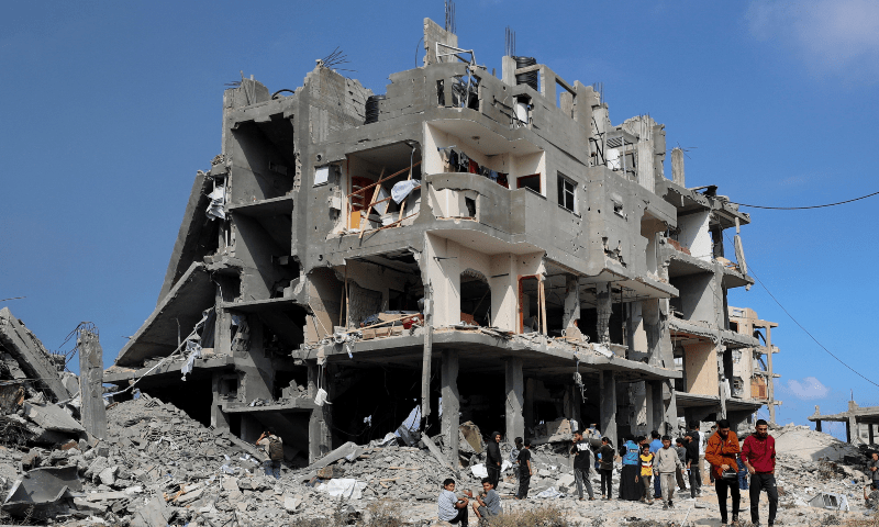 Palestinians gather at the site of an Israeli strike on a house, in Jabalia, in the northern Gaza Strip on April 28, 2025. — Reuters/Mahmoud Issa