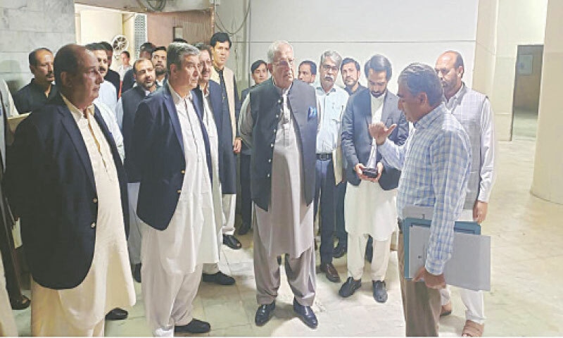 Housing Minister Mian Riaz Hussain Pirzada is being briefed during his visit to Shaheed-i-Millat Secretariat in Islamabad on Saturday. — INP Housing Minister Mian Riaz Hussain Pirzada is being briefed during his visit to Shaheed-i-Millat Secretariat in Islamabad on Saturday. — INP