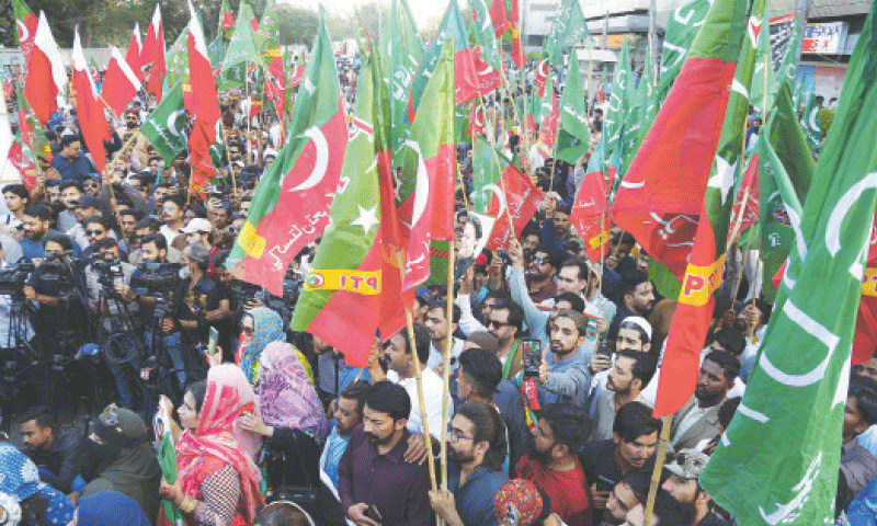 Activists of the Pakistan Tehreek-i-Insaf and Grand Democratic Alliance stage a protest at the Karachi Press Club. — Shakil Adil/ White Star Activists of the Pakistan Tehreek-i-Insaf and Grand Democratic Alliance stage a protest at the Karachi Press Club. — Shakil Adil/ White Star