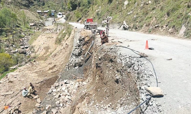 A retaining wall being built along Yakhtangay Puran Road in Shangla. &mdash; Dawn