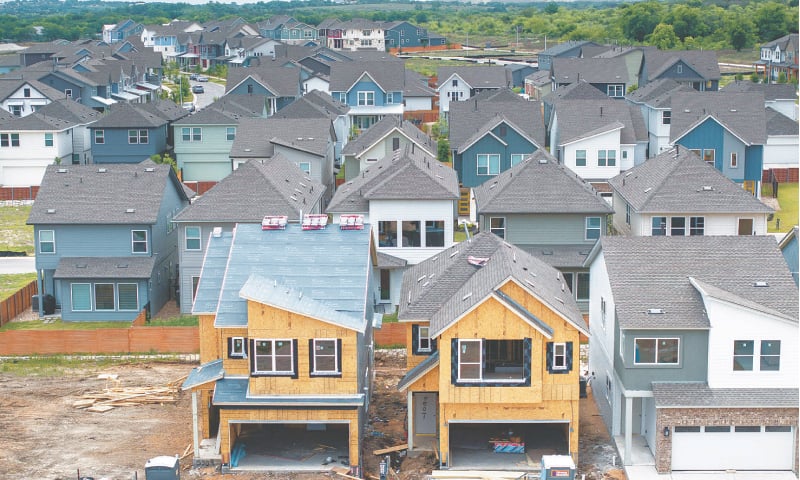 In an aerial view, houses undergo construction in a neighborhood in Austin, Texas. Housing starts dropped 11.4pc in March according to recent Census Bureau data. D.R. Horton has further indicated a slow start after the company missed earnings expectations earlier last week.&mdash;AFP