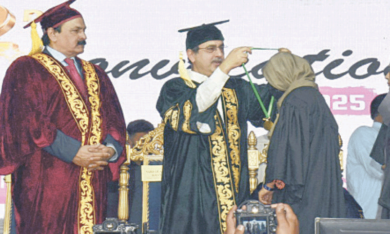 DERA GHAZI KHAN: Federal Minister for Energy Awais Ahmed Khan Leghari confers a medal on a graduate at the convocation of the Ghazi University. — APP DERA GHAZI KHAN: Federal Minister for Energy Awais Ahmed Khan Leghari confers a medal on a graduate at the convocation of the Ghazi University. — APP